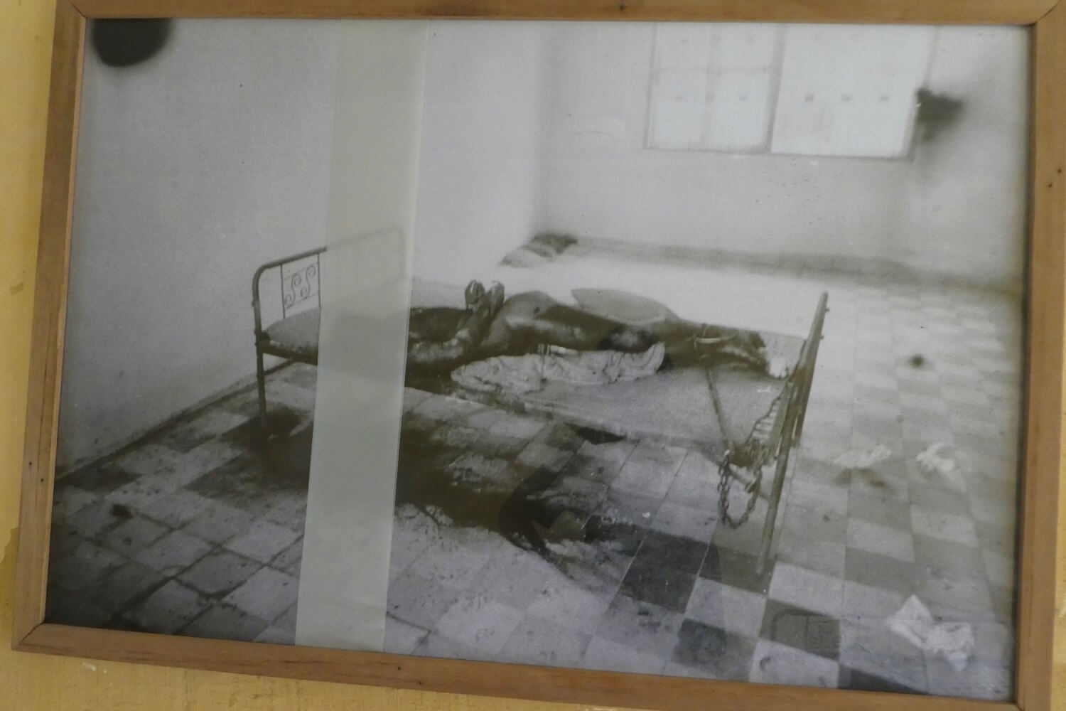Een foto van een slachtoffers uit de Tuol Sleng S21
